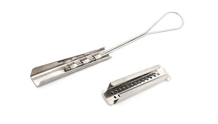 Drop wire clamps maintain cable tension