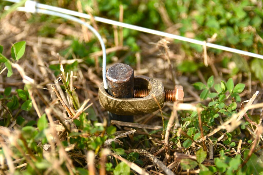 Ground rod clamps connect grounding conductors to electrodes